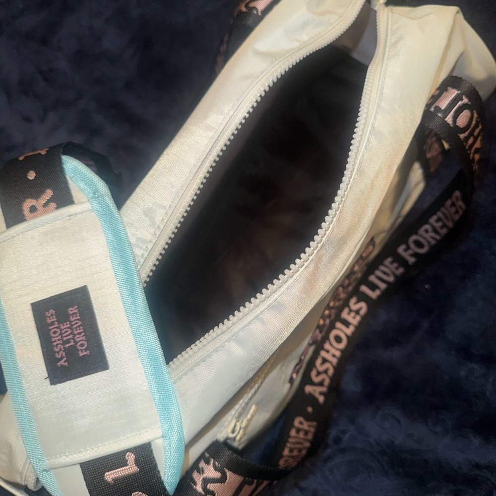A**Holes Live Forever Emotional Baggage Light Blue Duffel Bag View 4